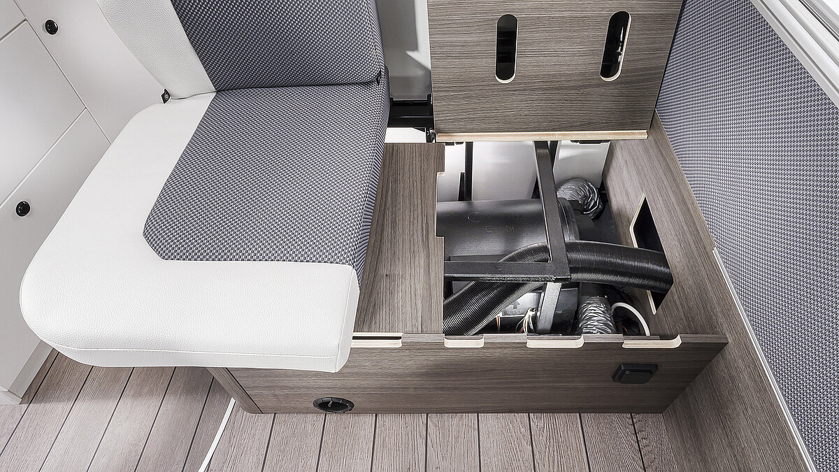 Truma diesel heating under the seat bench
