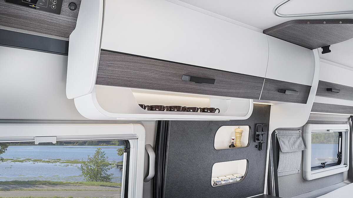 Furniture in the VANTourer panel van with white decor and elegant accents in Malaga Smoke