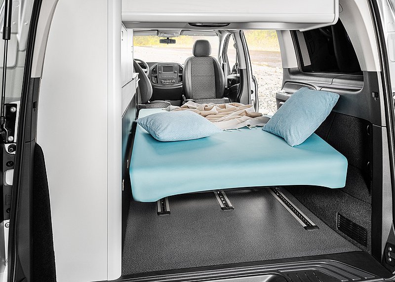 [Translate to Englisch:] VANTourer Urban Rückbank des Camper Van wird zum Bett